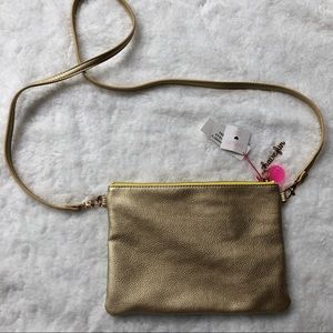 bando mint and gold reversible clutch